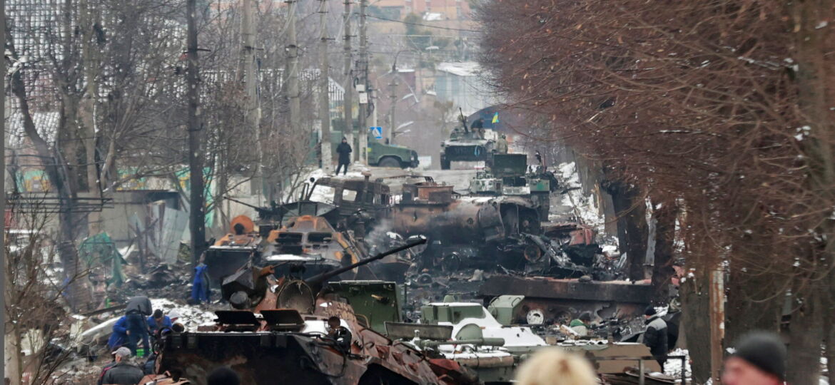 A view shows destroyed military vehicles on a street in Bucha